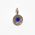 Golden round pendant with center blue gemstone and star detail for birthstone necklace - Rose Gold September