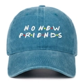 Close-up of white NO NEW FRIENDS embroidery on a washed blue denim baseball cap - One Size / Lake Blue