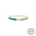 Detail of 925 silver ring with blue enamel and a square gemstone inlay on a golden band - Light Blue Enamel Blue Stone Size 6