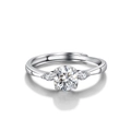 Macro shot of silver ring featuring a six-prong setting and radiant round-cut moissanite stone - Sun Moon And Stars (One Carat)