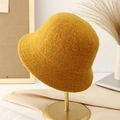 Close-up of yellow knit bucket hat showing warm texture and fisherman hat style. - M (56-58cm) / Orange