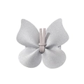 Macro detail of a silver butterfly hair clip made of textured leather and soft suede fabric - Silver