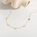 Detail view of MAMA gold necklace with intricate rose flower and sparkling zircon accent - 14K Gold Plated/Rose Flower MAMA