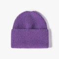 Purple cable knit ponytail hat for women featuring warm ribbed texture and rolled cuff edge - Heather Purple