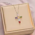 Cross pendant necklace with colorful oval gemstones and silver-tone wavy chain - 6045 Cross Color Zircon / Silver/Rainbow Zirconia