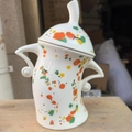 White canister with colorful spots and unique handles in a vibrant attitude style - New Multi-color Ceramic