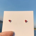 Elegant gold heart earrings with red gemstones displayed on a white card against blue sky - 925 Silver Needle / Gold Heart Stud Earrings