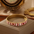 Bracelet jonc en émail doré avec motifs spirales rouges et roses sur boîte à bijoux - Rayure Spirale Rouge Rose Blanc Gris