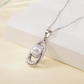 Silver stainless steel necklace featuring a hammered oval pendant with a white pearl - Hammered Oval Pearl Style (137611)