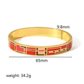 Detail showing 9.8mm width and 65mm inner diameter of gold enamel bangle bracelet - Red and Pink Geometric Enamel Style (TB7047)