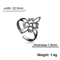 Black stainless steel Celtic knot ring with 22.9mm width and 1.4g weight on white background - Black