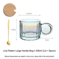 Vertical textured glass mug with large ring handle, lid and golden cherry spoon - Iridescent Striped Mug with Lid and Spoon