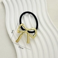 Elastic hair tie with a 5cm gold metallic bow charm for women's ponytail styles - Gold-Bowknot
