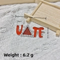 UATE letter brooch with red rhinestones and pearls in silver finish, size 4.7x2cm - Silver Triangle Gold Stone