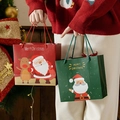 Christmas-themed red and green gift bags with Santa patterns and thick rope handles - One Size / Red Gift Bag