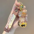 Portachiavi boccetta di bubble tea giallo con cinturino marrone e piccolo ciondolo orso - Tè al Latte dell'Orso - Bottiglia per Bevande