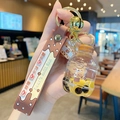 Yellow milk tea bottle keychain with brown silicone strap and tiny bear charm decoration - Bear Milk Tea - Beverage Bottle