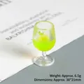 Miniature lime green resin wine glass charm with 38x21mm size and 6.5g weight detail - Green