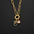 14K gold plated stainless steel necklace with letter O and pink crystal pendant - Letter O (XNL0097)