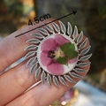 Close-up of 4.5cm handmade brooch with pink dried flowers in silver leaf frame - Pink Round (Style E)