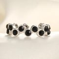 Detailed view of silver tone ring with wave-pattern micro-paved black zircons - Adjustable Open / Steel Color Black Zircon Irregular Style
