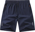 Detail der marineblauen Sporthose mit orangen Reißverschlüssen und Reflektorstreifen - S / Unterteile / Marineblau