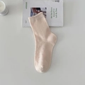 Beige cotton crew socks with hollow mesh knit and ruffled trim in a minimalist setting - One Size / Milky Pink