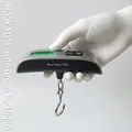 Bilancia digitale per valigie 50kg con finitura argento e schermo retroilluminato - Stile Gancio / Retroilluminazione Verde