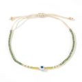 Pulsera tejida minimalista con cuentas de colores y dije de ojo turco ajustable - Verde