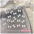50pcs Jelly White bow nail charms, 8x6mm translucent resin bowknots for manicure decor - 50 Pcs/Pack / Jelly White