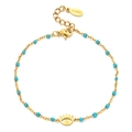 Close-up of golden stainless steel eye bracelet with turquoise beads on white base - Lake Blue