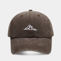 Detailed view of white mountain peak embroidery on a brown washed cotton baseball cap - Coffee