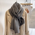 Dark grey long scarf with pleated texture styled over a wool coat for autumn - Dark Gray