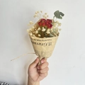 Detail of mini dried red rose and gypsophila bouquet wrapped in vintage newsprint paper - Vintage Mini Orange Rose