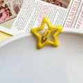 Vibrant yellow star-shaped metal hair clip with glossy hollow design for girls - Yellow