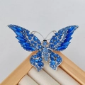 Vintage blue crystal butterfly brooch with silver base and intricate rhinestone wings - Silver Blue Butterfly Brooch