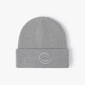 Grey winter knit beanie with white embroidered smiley face and ribbed texture finish - One Size / Noble Grey
