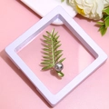 Green leaf brooch with grey pearl inlay in a white jewelry gift box on pink backdrop - XZ064-Grey Pearl Leaf-Boxed