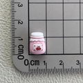 Miniatur Harzdose in Rosa mit Kirschmuster und Lineal für 1,3 cm Größenvergleich - Rosa Getränk