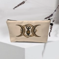Detail of canvas makeup bag featuring the Triple Goddess symbol and black zipper - 53-Beige Triple Goddess