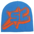 Close-up of bright blue beanie featuring jacquard knitted orange star and SG lettering - Cyan Blue