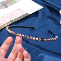 6mm natural pink stone beads on a slim black metal headband for handmade hair styling - 6mm Rhodochrosite