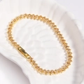 Detail of champagne marquise zircon stones and gold plating on a knotted tennis bracelet - Champagne - Gold