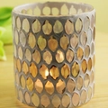 Mosaic glass candle holder with amber and gold oval tiles and a glowing tealight - Apricot