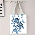 Détail d'un grand sac en toile blanc avec motifs floraux bleus et sangles robustes - Motif Floral Bleu et Blanc (jiayingstd89)