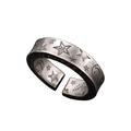 Detailed close-up of vintage silver ring featuring engraved star and smiley face motifs - Adjustable Open / Smiling Star