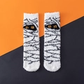 White fluffy mummy Halloween socks with bandage patterns and yellow eyes on orange background - One Size / Mummy Eyes Pattern