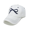 Close-up of white baseball cap featuring navy blue embroidered bow and detailed stitching - White / M(56-58cm)