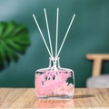 Preserved pink flower aroma diffuser in glass bottle with white fiber reed sticks - Encounter - 100ml