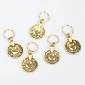 Five gold coin charms with leaf patterns and rings for African braid hairstyles - Coin / Gold